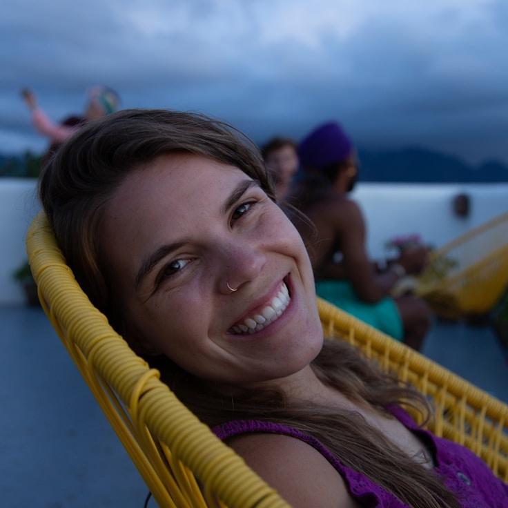 Alex Morgan, Lead Design Curator at Digital Trend Analytics, reviewing corporate floral arrangements